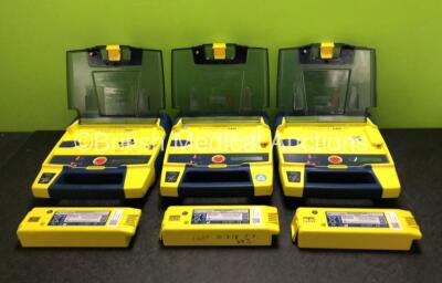 3 x Cardiac Science Powerheart AED G3 Defibrillators with 6 x Batteries (All Power Up - 3 x in Photo, 3 x in Defibrillators)