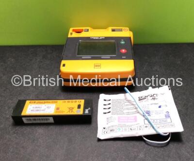 Medtronic Physio Control Lifepak 1000 Defibrillator *Software Version 2.51* with 2 x Batteries and 1 x Skintact Electrode Pack (Powers Up with Damage to Casing - See Photos)