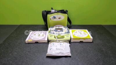 Zoll AED Plus Defibrillator In Carry Case (Powers Up) with 3 x in Date Electrode Packs