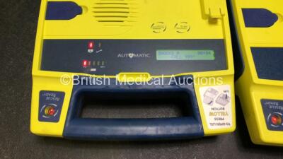 3 x Cardiac Science Powerheart AED G3 Defibrillators (All Power Up with Stock Battery, Batteries Not Included, 1 x Faulty Screen - See Photos) - 5