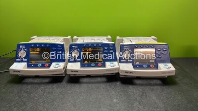 3 x Philips Heartstart XL Defibrillators Including Pacer, ECG and Printer Options (All Power Up) *SN US00119997, US00232101, US00459957*