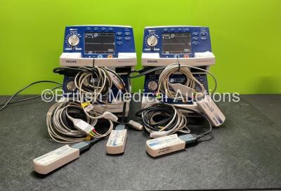 4 x Philips Heartstart XL Defibrillators Including ECG and Printer Options with 4 x Paddle Leads, 4 x Philips M3725A Test Loads and 4 x 3 Lead ECG Leads (All Power Up) *SN US00458261, US00468747, US00578464, US00595806*