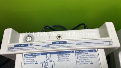 4 x Philips Heartstart XL Defibrillators Including ECG and Printer Options with 4 x Paddle Leads, 4 x Philips M3725A Test Loads and 4 x 3 Lead ECG Leads (All Power Up) *SN US00458261, US00468747, US00578464, US00595806* - 4