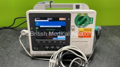 Philips Heartstart XL+ Defibrillator Including ECG and Printer Options with 1 x Paddle Lead, 1 x 3 Lead ECG Lead, 1 x Battery and 1 x Philips M3725A Test Load (Powers Up) *SN US61717190* - 2