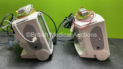 2 x Philips Heartstart MRx Defibrillators Including ECG and Printer Options with 2 x Paddle Leads, 2 x 3 Lead ECG Leads, 2 x Philips M3725A Test Loads and 2 x Philips M3539A Modules (Both Power Up) - 3