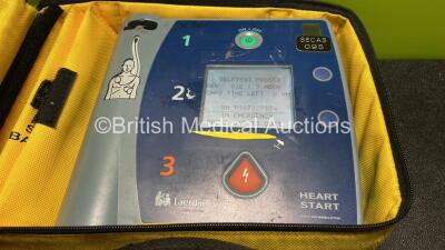 2 x Laerdal Heartstart FR2+ Defibrillators with 2 x Philips M3863A Batteries *Install Dates 02-2022, 11-2023* 2 x Skintact Electrodes in Carry Bags (Both Power Up and Pass Self Tests) *SN 0207225913, 0307227374* - 3