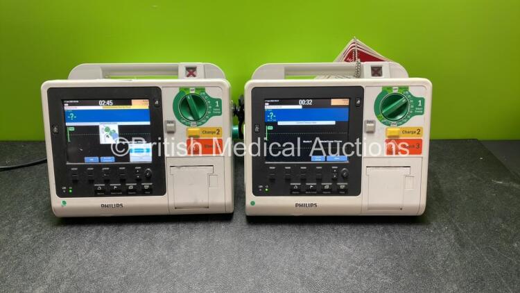 1 x Philips Heartstart XL+ Defibrillator Including Pacer,  ECG and Printer Options; 1 x Philips Heartstart XL+ Defibrillator Including ECG and Printer Options (Both Power Up)