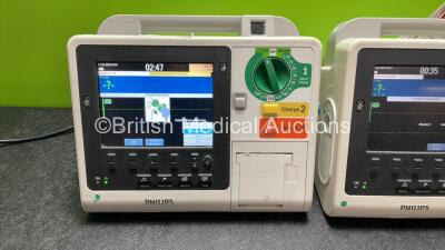 1 x Philips Heartstart XL+ Defibrillator Including Pacer,  ECG and Printer Options; 1 x Philips Heartstart XL+ Defibrillator Including ECG and Printer Options (Both Power Up) - 2