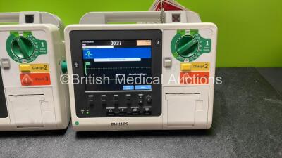 1 x Philips Heartstart XL+ Defibrillator Including Pacer,  ECG and Printer Options; 1 x Philips Heartstart XL+ Defibrillator Including ECG and Printer Options (Both Power Up) - 3