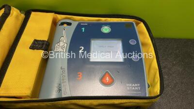 1 x Laerdal Heartstart FR2+ Defibrillator, 1 x Philips Heartstart FR2+ Defibrillator with 2 x Philips M3863A Batteries *Install Dates 11-2025, 01-2023* 2 x Skintact Electrodes in Carry Bags (Both Power Up and Pass Self Tests) *SN 0411890705, 1007258750* - 2