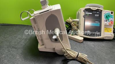 2 x Philips Heartstart MRx Defibrillators Including Pacer, ECG and Printer Options with 2 x Philips M3539A Modules, 1 x Philips M3538A Batteries, 2 x Paddle Leads, 2 x Skintact Electrodes *Both In Date* 2 x 3 Lead ECG Leads and 2 x Philips M3725A Test Loa - 5