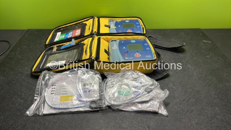 2 x Laerdal Heartstart FR2+ Defibrillators with 2 x Philips M3863A Batteries *Install Dates 11-2023, 09-2025* 4 x Skintact Electrodes in Carry Bags (Both Power Up and Pass Self Tests) *SN 1205177273, 0510801444*