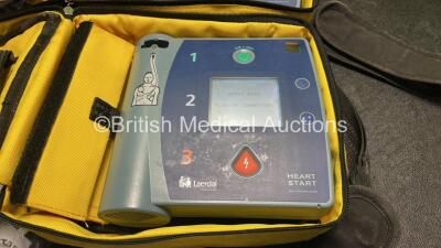 2 x Laerdal Heartstart FR2+ Defibrillators with 2 x Philips M3863A Batteries *Install Dates 11-2023, 09-2025* 4 x Skintact Electrodes in Carry Bags (Both Power Up and Pass Self Tests) *SN 1205177273, 0510801444* - 2