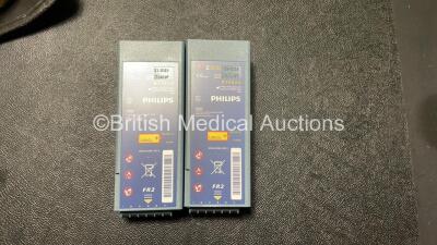 2 x Laerdal Heartstart FR2+ Defibrillators with 2 x Philips M3863A Batteries *Install Dates 11-2023, 09-2025* 4 x Skintact Electrodes in Carry Bags (Both Power Up and Pass Self Tests) *SN 1205177273, 0510801444* - 4