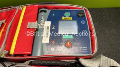 2 x Laerdal Heartstart FR2+ Defibrillators with 2 x Philips M3863A Batteries *Install Dates 08-2020, 07-2018* 2 x Skintact Electrodes in Carry Bags (Both Power Up and Pass Self Tests) *SN 1207264503, 0307227373** - 3