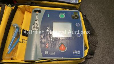 2 x Laerdal Heartstart FR2+ Defibrillators with 2 x Philips M3863A Batteries *Install Dates 11-2020, 12-2020* 2 x Skintact Electrodes in Carry Bags (Both Power Up and Pass Self Tests) *SN 051801553, 0307227461* - 3