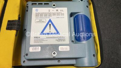 2 x Philips Heartstart FR2+ Defibrillators with 2 x Philips M3863A Batteries *Install Dates 11-2025, 11-2023* 2 x Skintact Electrodes in Carry Bags (Both Power Up and Pass Self Tests) *SN 0411890746, 1010990296* - 5