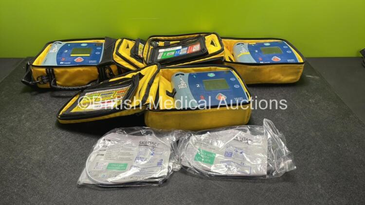 Job Lot Including 2 x Laerdal Heartstart FR2+ Defibrillators, 1 x Philips Heartstart FR2+ Defibrillator with 3 x Philips M3863A Batteries *Install Dates 10-2021, 06-2024. 09-2019* 2 x Skintact Electrodes in Carry Bags (All Power Up and Pass Self Tests) *S