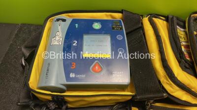 Job Lot Including 2 x Laerdal Heartstart FR2+ Defibrillators, 1 x Philips Heartstart FR2+ Defibrillator with 3 x Philips M3863A Batteries *Install Dates 10-2021, 06-2024. 09-2019* 2 x Skintact Electrodes in Carry Bags (All Power Up and Pass Self Tests) *S - 2