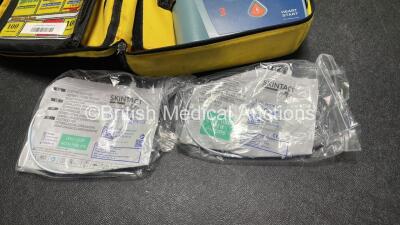 Job Lot Including 2 x Laerdal Heartstart FR2+ Defibrillators, 1 x Philips Heartstart FR2+ Defibrillator with 3 x Philips M3863A Batteries *Install Dates 10-2021, 06-2024. 09-2019* 2 x Skintact Electrodes in Carry Bags (All Power Up and Pass Self Tests) *S - 5