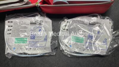 2 x Laerdal Heartstart FR2+ Defibrillators with 2 x Philips M3863A Batteries *Install Dates 10-2021, 02-2022* 2 x Skintact Electrodes in Carry Bags (Both Power Up and Pass Self Tests) *SN 0207225980, 0207223925* - 3