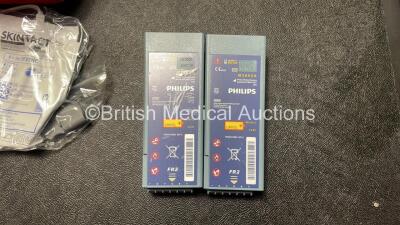 2 x Laerdal Heartstart FR2+ Defibrillators with 2 x Philips M3863A Batteries *Install Dates 10-2021, 02-2022* 2 x Skintact Electrodes in Carry Bags (Both Power Up and Pass Self Tests) *SN 0207225980, 0207223925* - 4