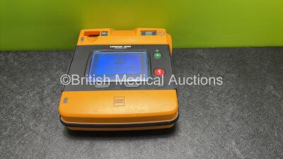 Physio Control Lifepak 1000 Defibrillator Software Version V2.51 with 1 x Medtronic Lifepak 1000 Battery Pack (Powers Up) *SN 40094627*