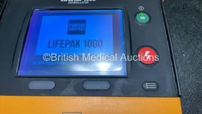 Physio Control Lifepak 1000 Defibrillator Software Version V2.51 with 1 x Medtronic Lifepak 1000 Battery Pack (Powers Up) *SN 40094627* - 2