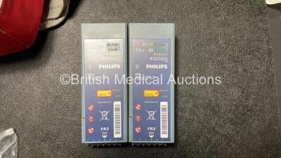 2 x Laerdal Heartstart FR2+ Defibrillators with 2 x Philips M3863A Batteries *Install Dates 06-2025, 11-2025* 2 x Skintact Electrodes in Carry Bags (Both Power Up and Pass Self Tests) *SN 1207264516, - 4