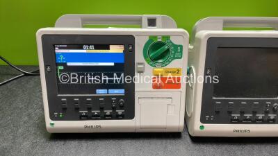 1 x Philips Heartstart XL+ Defibrillator Including Pacer,  ECG and Printer Options; 1 x Philips Heartstart XL+ Defibrillator Including ECG and Printer Option (1 Powers Up, 1 No Power) - 2