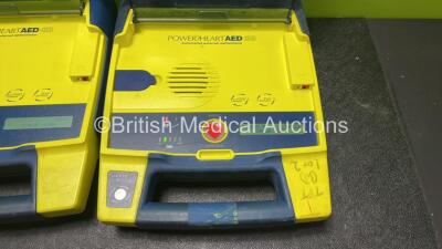 3 x Cardiac Science Powerheart AED G3 Defibrillator with 3 x Batteries (All Power Up, 1 with Faulty Display- See Photo) - 2