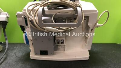 2 x Philips Heartstart MRx Defibrillators / Monitors Including ECG and Printer Options with 3 x Paddle Leads, 2 x Philips M3725A Test Loads, 2 x ECG Lead Connectors and 2 x Philips M3539A Modules (Both Power Up) - 5