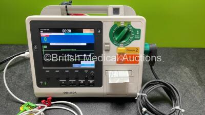 Philips Heartstart XL+ Defibrillator Including ECG and Printer Options with 1 x Paddle Lead, 1 x Philips M3725A Test Load and 1 x 3 Lead ECG Lead (Powers Up) *Mfd 04-2014* *SN US41412211* - 3