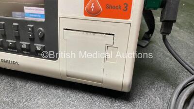 Philips Heartstart XL+ Defibrillator Including ECG and Printer Options with 1 x Paddle Lead, 1 x Philips M3725A Test Load and 1 x 3 Lead ECG Lead (Powers Up) *Mfd 04-2014* *SN US41412211* - 5