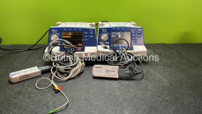 1 x Agilent Heartstart XL Defibrillator Including ECG and Printer Options and 1 x Philips Heartstart XL Defibrillator Including ECG and Printer Options with 2 x Paddle Leads, 2 x Philips M3725A Test Loads and 2 x 3 Lead ECG Leads (Both Power Up) *SN US001