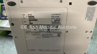 4 x Philips Heartstart XL Defibrillators Including ECG and Printer Options with 4 x Paddle Leads, 4 x Philips M3725A Test Loads and 4 x 3 Lead ECG Leads (All Power Up) *SN US00578463, US00591365, US00588705, US00117258* - 4