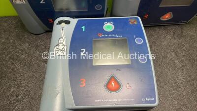 3 x Agilent Heartstart FR2 Defibrillators (All No Power, 2 with Damage Casings-See Photos, Batteries not Included) - 2