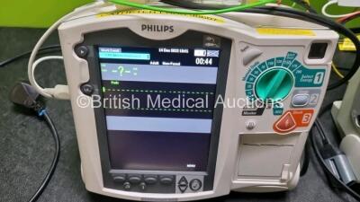 2 x Philips Heartstart MRx Defibrillators Including Pacing, ECG and Printer Options with 2 x Paddle Leads, 2 x Philips M3725A Test Loads, 2 x 3 Lead ECG Leads, 2 x Philips M3538A Batteries and 2 x Philips M3539A Modules (Both Power Up) *SN US000333081 / U - 3