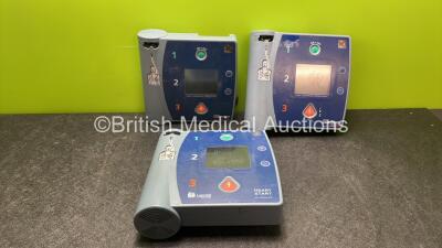 2 x Laerdal Heartstart FR2 Defibrillators (Both No Power when Tested, 1 Damaged-See Photo) 1 x Laerdal Heartstart FR2+ Defibrillator (Powers Up when Tested with Stock Battery-Battery not Included)