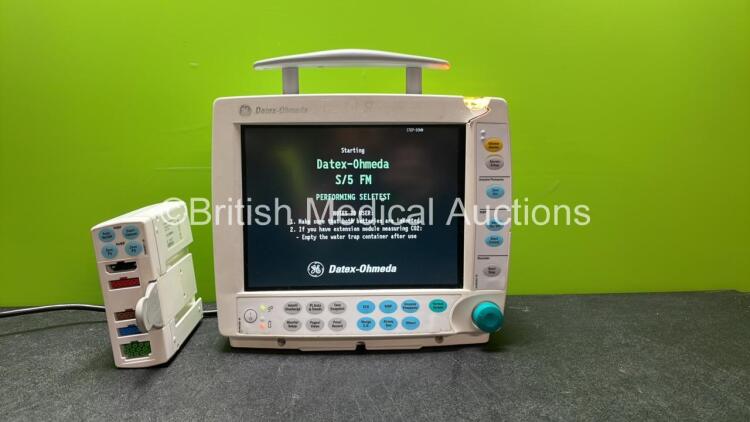 GE Datex Ohmeda S/5 FM Patient Monitor with 1 x GE E-PSMP-00 Module Including ECG, SpO2, NIBP, P1, P2, T1 and T2 Options and 2 x SM 201 Batteries (Powers Up with Damaged Light-See Photo) *SN 6285621, 6301555*