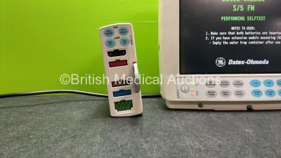 GE Datex Ohmeda S/5 FM Patient Monitor with 1 x GE E-PSMP-00 Module Including ECG, SpO2, NIBP, P1, P2, T1 and T2 Options and 2 x SM 201 Batteries (Powers Up with Damaged Light-See Photo) *SN 6285621, 6301555* - 2