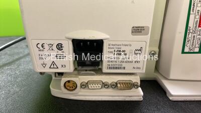 GE Datex Ohmeda S/5 FM Patient Monitor with 1 x GE E-PSMP-00 Module Including ECG, SpO2, NIBP, P1, P2, T1 and T2 Options and 2 x SM 201 Batteries (Powers Up with Damaged Light-See Photo) *SN 6285621, 6301555* - 6