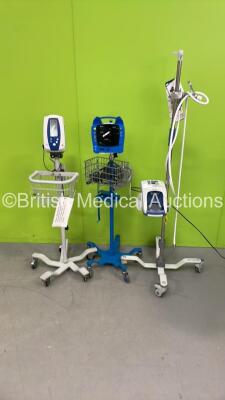 1 x Fisher and Paykel Airvo 2 Humidifier on Stand with Hose, 1 x GE ProCare Auscultatory 300 Vital Signs Monitor on Stand and 1 x Welch Allyn 420 Series Patient Monitor on Stand (All Power Up)