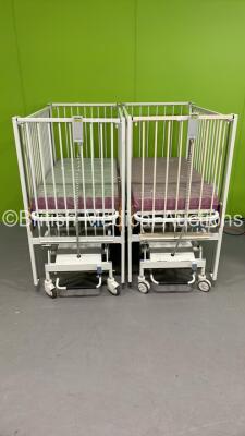 2 x Huntleigh Electric Infant Cots with Mattresses and Controllers (Both Power Up)