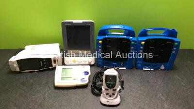 Job Lot Including 2 x GE Dinamap ProCare Auscultatory Monitors (Untested Due to No Power Supply, Both with Damage to Casing - See Photos) 1 x Mindray VS-900 Patient Monitor (Powers Up with Damage to Casing - See Photos) 1 x Teledyne Analytical Instruments