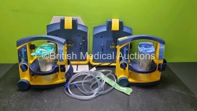 2 x Laerdal LSU Suction Units (Both Power up with Damage to Casing - See Photos) with 2 x Suction Cup, 2 x Hoses and 2 x LSU Wall Brackets (Both with Cut Cables)