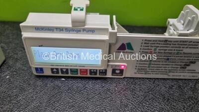 5 x CME Medical T34 Ambulatory Syringe Pumps (All Power Up when Tested with Stock Batteries-Batteries Not Included) *SN S27670 / S27354 / S27708 / S00404607 / S27665* - 5