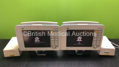 2 x Drager Infinity Delta Patient Monitors with HemoMed 1, Aux/Hemo 3, NBP and MultiMed Options, 2 x Siemens Docking Stations and 2 x AC Power Supplies (Both Power Up, 1 x Damage to Casing - See Photos)