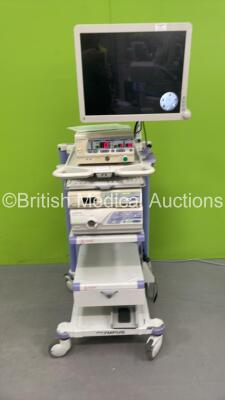 Olympus Stack Trolley with Advan Monitor, Olympus OES UHI-3 Insufflator, Olympus Visera Pro OTV-S7Pro Camera Control Unit, Olympus Evis Lucera CLV-260SL Light Source and Olympus Footswitch (Powers Up)