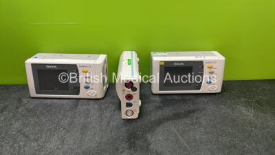 2 x Philips IntelliVue X2 Handheld Patient Monitors Including ECG, SpO2, NBP, Press and Temp Options with 1 x Philips M3001A Module Including ECG, SpO2, NBP, Press and Temp Options (Both Power Up, Batteries Not Included) *SN DE907V1056, DE95039379, DE9503